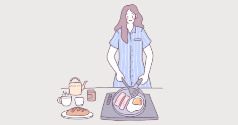 料理をしている女性