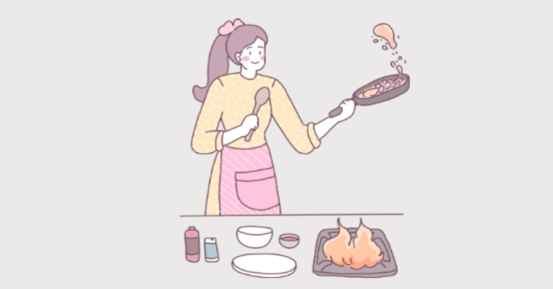 料理をしている女性